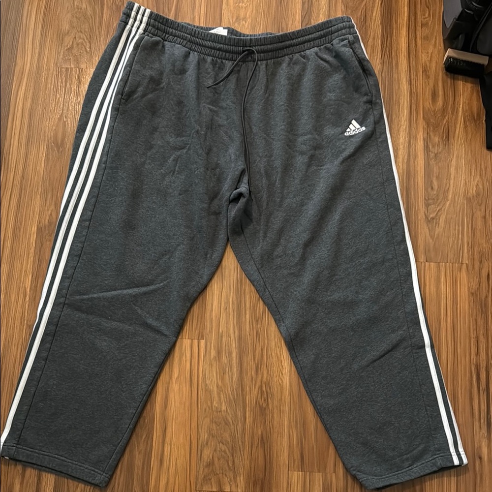 Adidas Gray Sweatpants with Three-Stripe Design